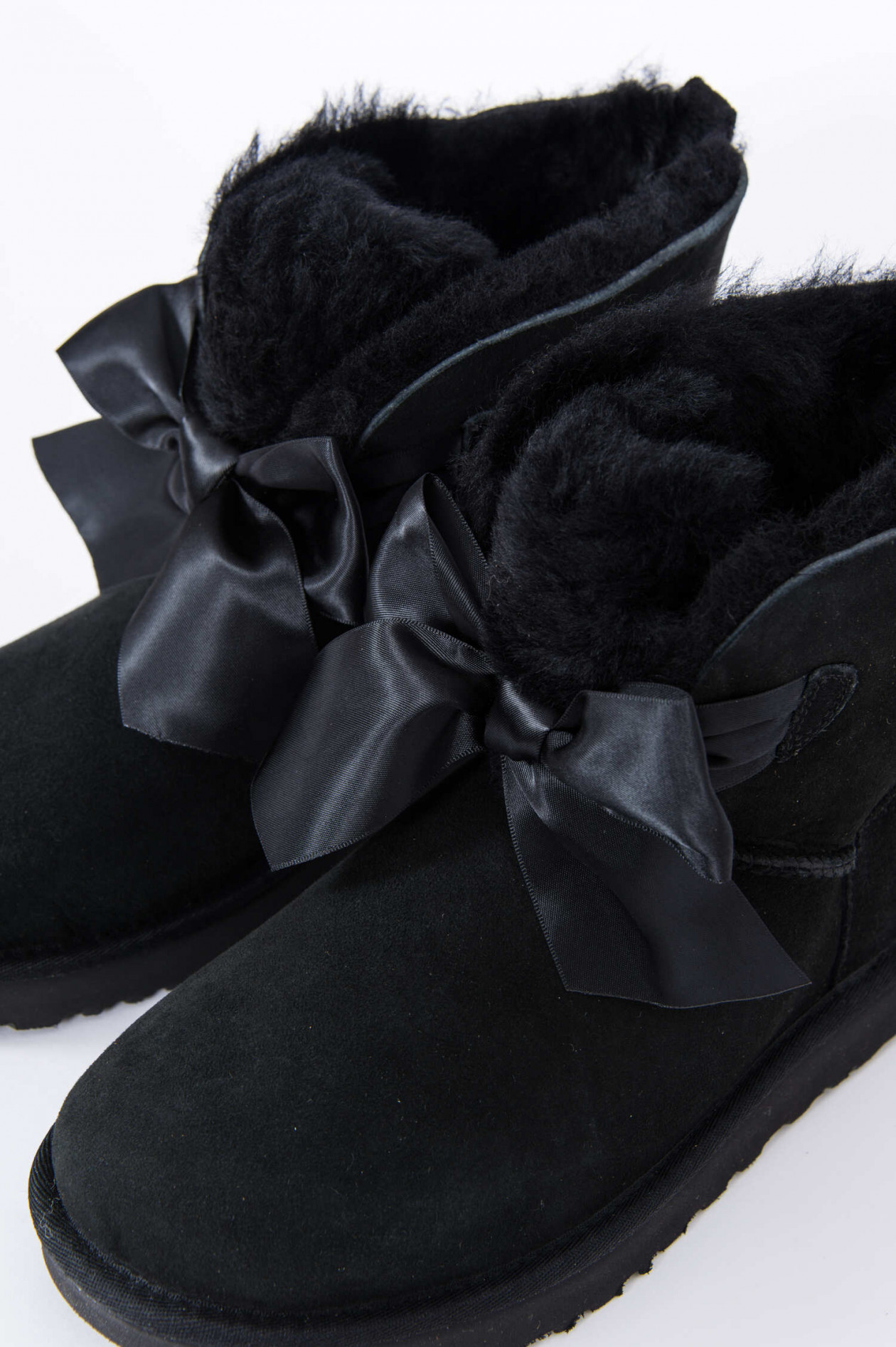 Ugg gita bow mini black hotsell