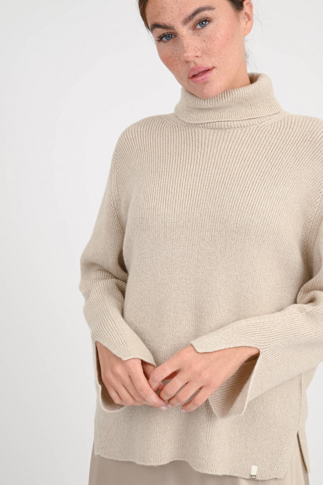 Herno Rollkragenpullover mit Glitzereffekt in Beige