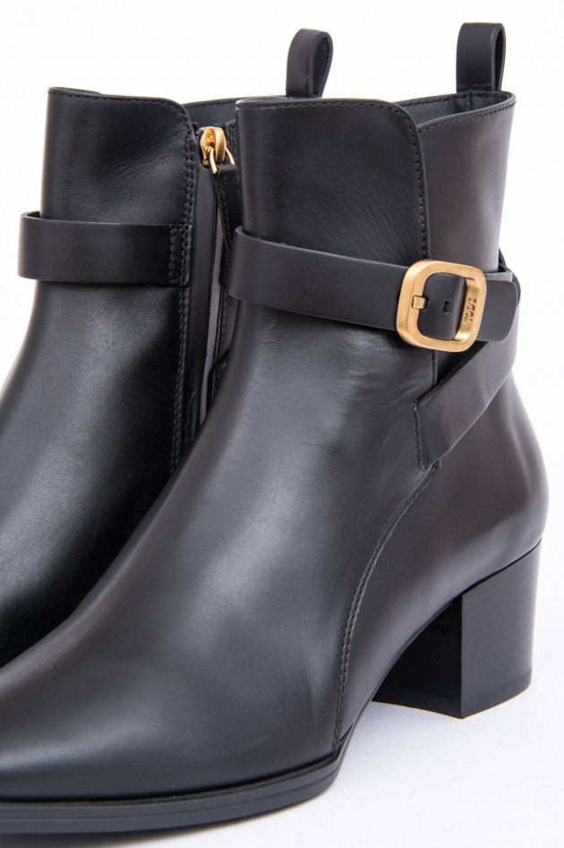 Tod's Stiefelete mit goldener Schnalle in Schwarz