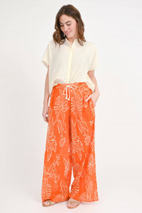 Baumwollhose mit Blumenmuster in Orange/Weiß