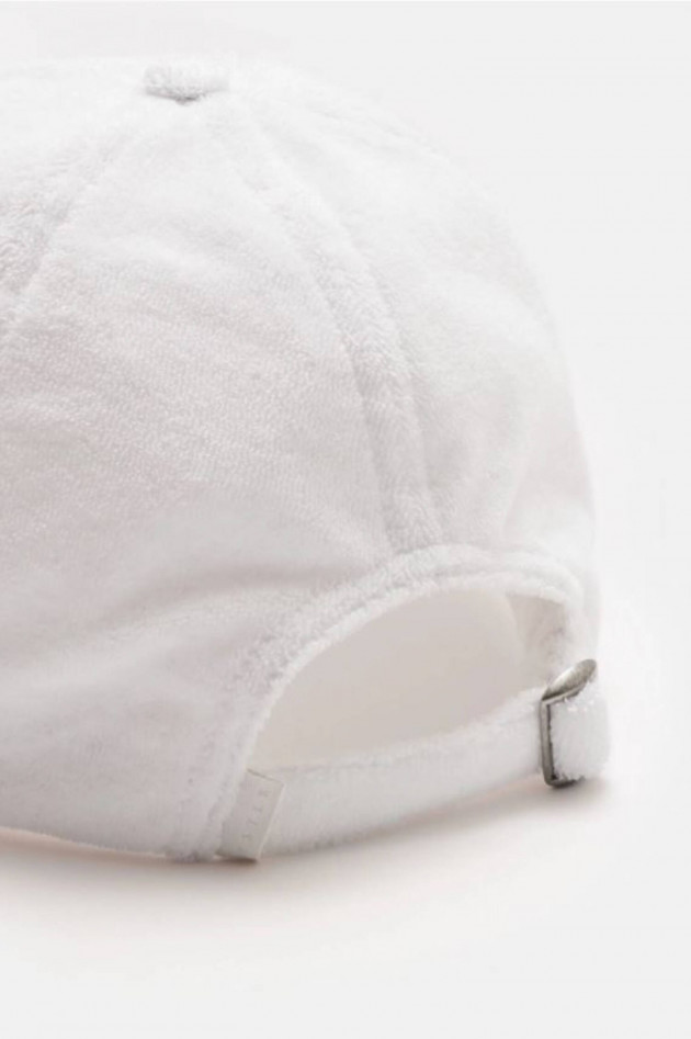 04651/ A trip in a bag Basecap aus Frottee in Ivory
